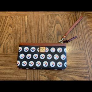 Dooney and Bourke Steelers Wristlet. Never used.